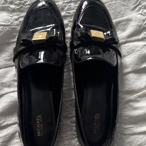 Michael Kors Shiny Black Loafers with Gold Accent